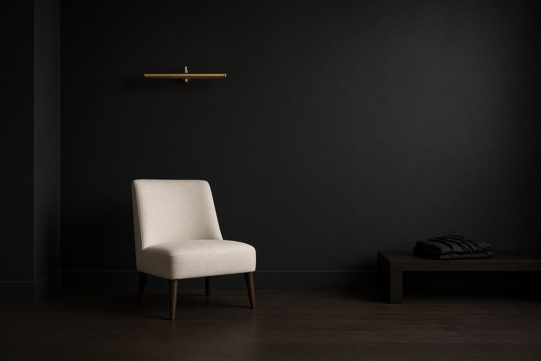 Black interior with one ivory chair.